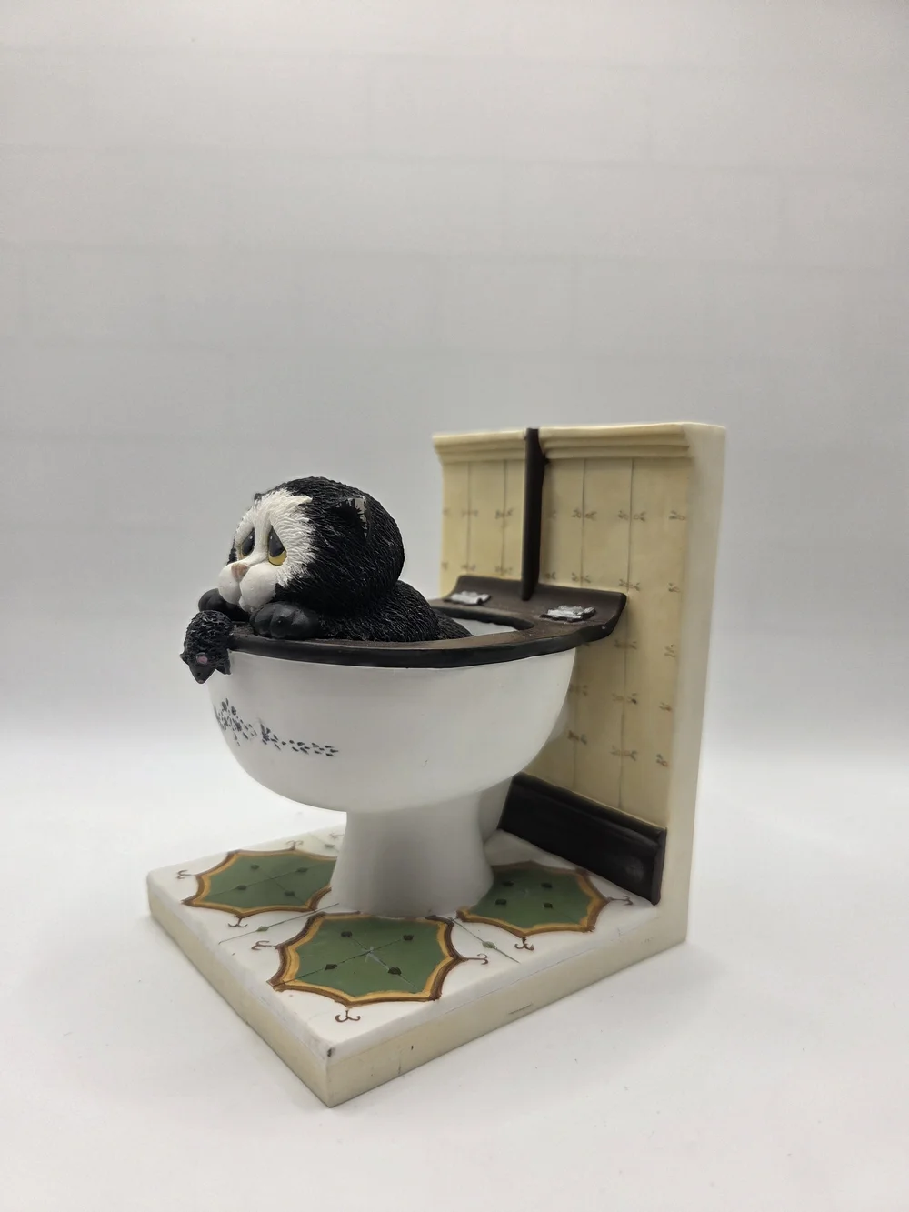R200. Down The Pan Black and White Cat in Toilet Figurine